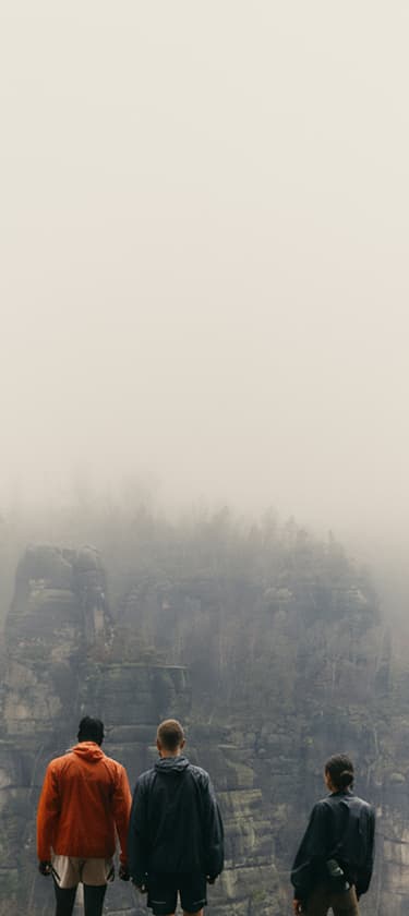 People overlooking cityscape